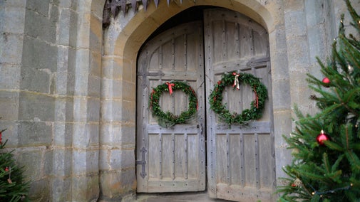 Christmas wreaths on the doors to the castle